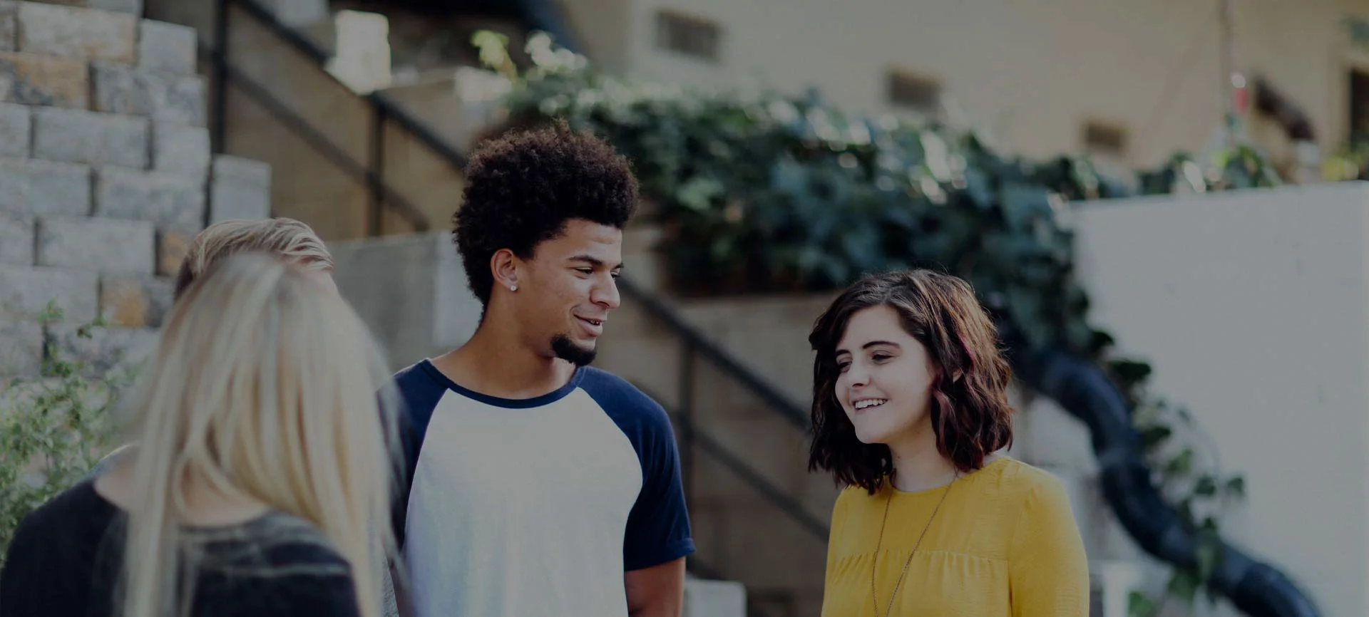 a pair of youth engage in kingston